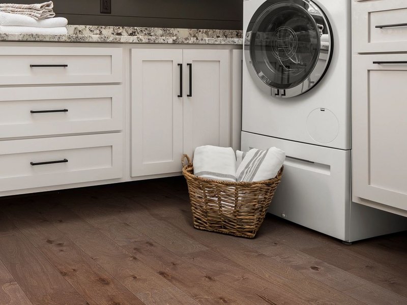 washing machine in bathroom with hardwood flooring Cathedral City, CA area by Canyon Floor Corporation / Canyon Floors